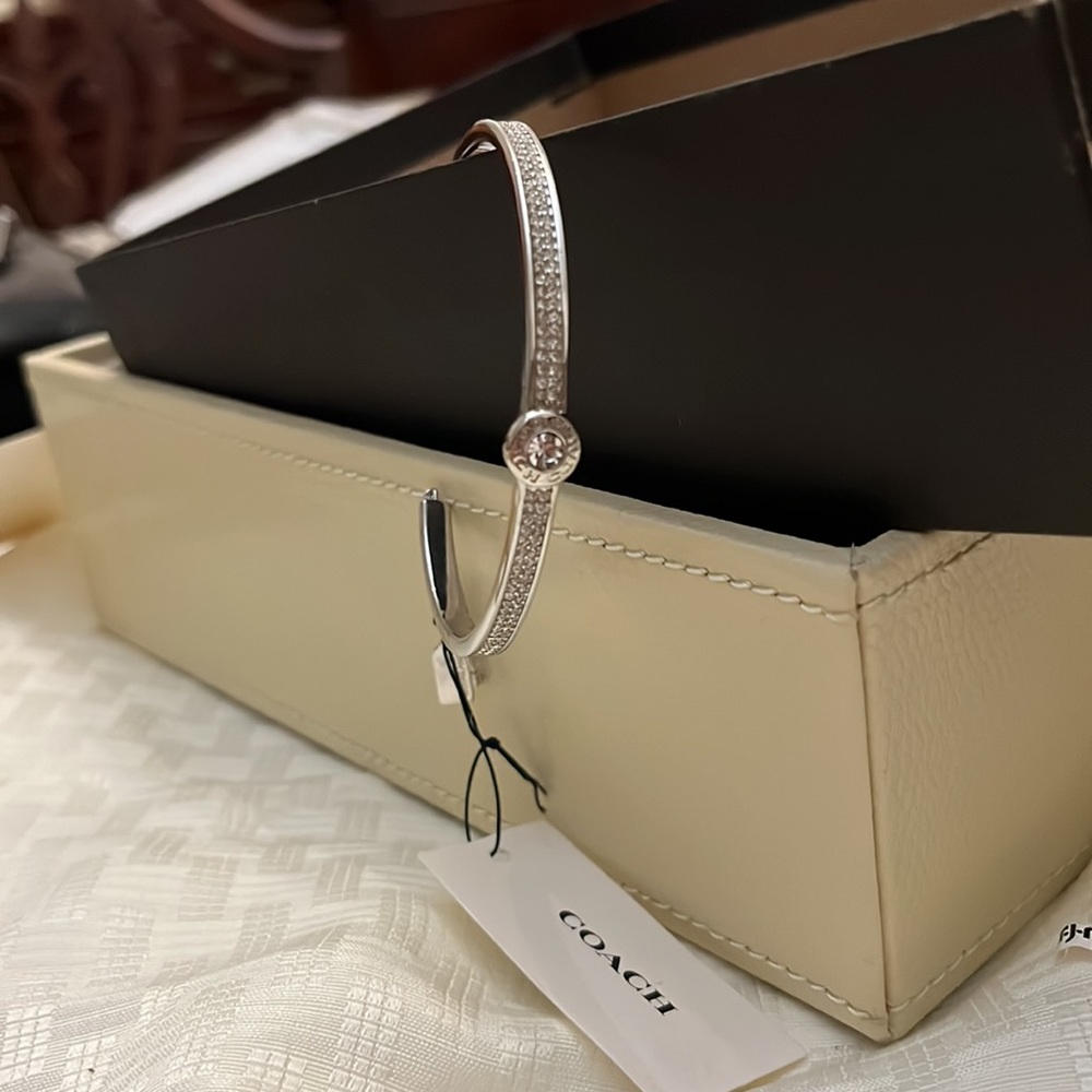 Coach silver bracelet bangle with clear stone